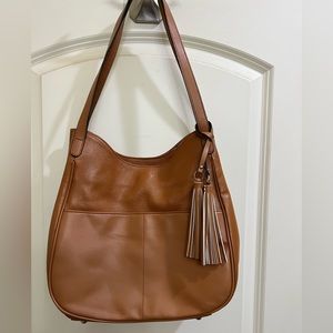 Szone bag in perfect near new condition. Measures 12”x10.5”